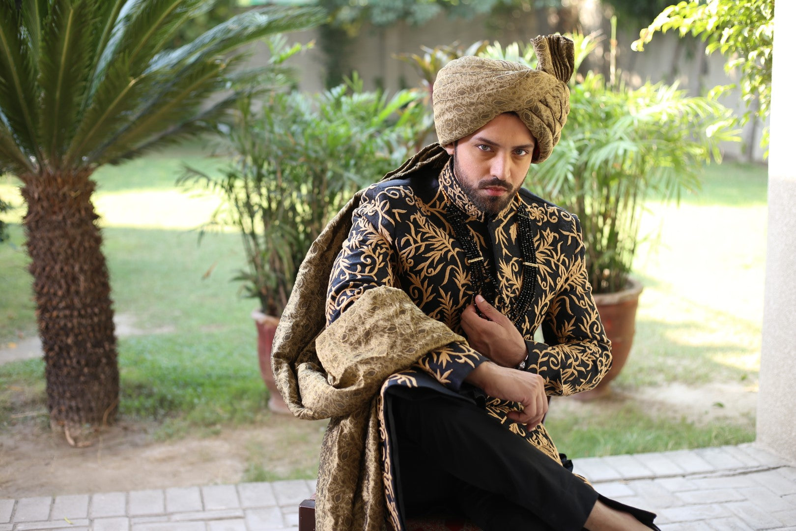 Megnificent Blackish Blue Gold Sherwani	Black n Blue