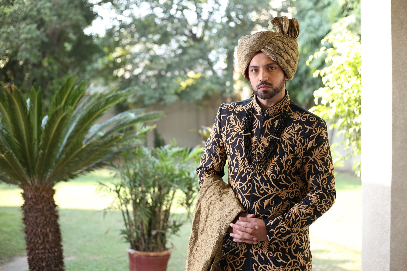 Megnificent Blackish Blue Gold Sherwani	Black n Blue